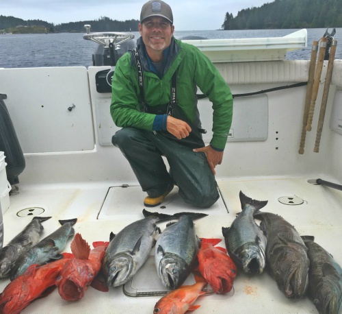 Sam holding two nice Chinook!